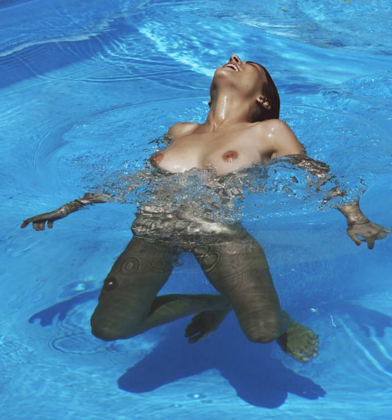 Naked Underwater Girl Drows and Swimming